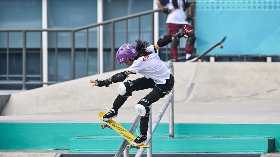 China's Cui Chenxi competes in the final of the women's street skateboarding event during the 2022 Asian Games in Hangzhou. - Hector Retamal/AFP/Getty Images