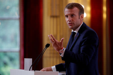 French President Emmanuel Macron delivers a speech during the annual French ambassadors' conference at the Elysee Palace in Paris, France, August 27, 2018. REUTERS/Philippe Wojazer/Pool