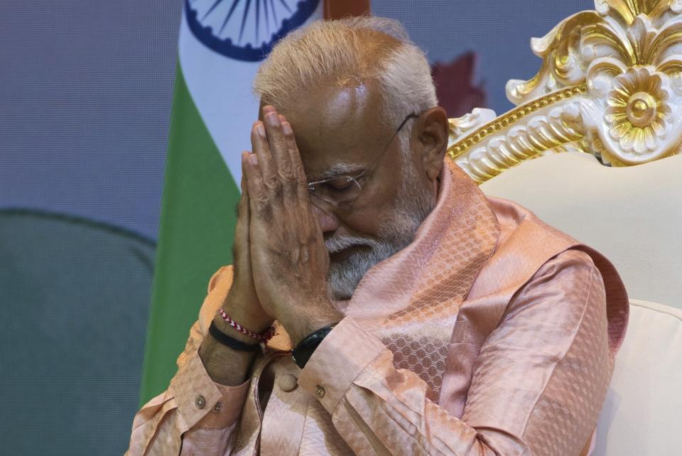 Indian Prime Minister Narendra Modi gestures during an event in Abu Mureikha, United Arab Emirates, Wednesday, Feb. 14, 2024. Modi visited the Middle East's first traditional stone-built Hindu temple Wednesday, internationalizing both his re-election campaign and his effort to push India from a secular state into a Hindu state. (AP Photo/Jon Gambrell)