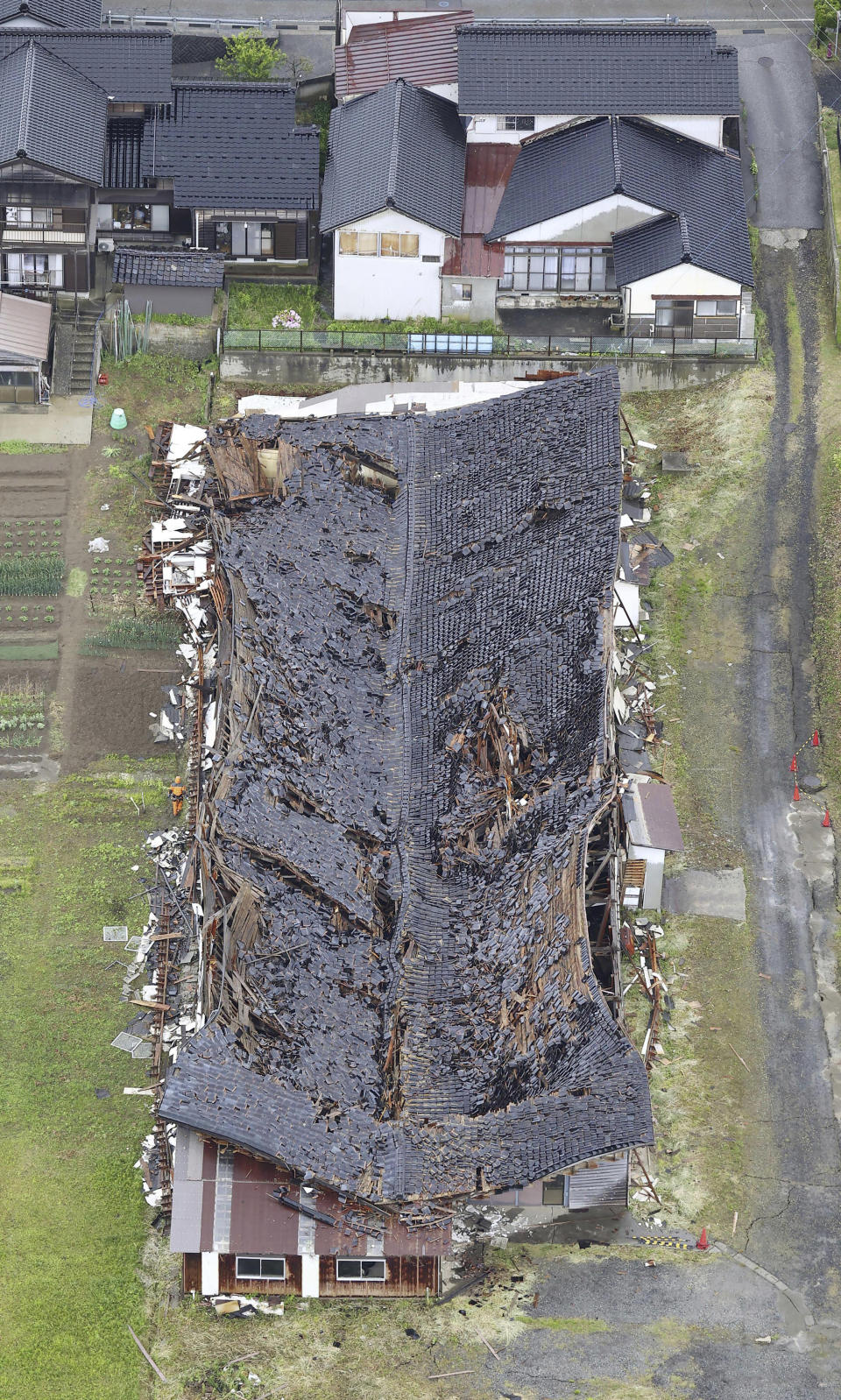 A building damaged by Friday's earthquake is seen in Suzu city, Ishikawa prefecture, central Japan Saturday, May 6, 2023. A strong, shallow earthquake hit central Japan on Friday afternoon. (Kyodo News via AP)