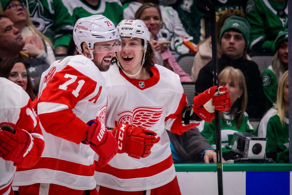 Detroit Red Wings center Dylan Larkin (71) and left wing Tyler Bertuzzi celebrates Larkin's goal against the Dallas Stars during the first period at the American Airlines Center on Friday, Jan. 3, 2020, in Dallas.