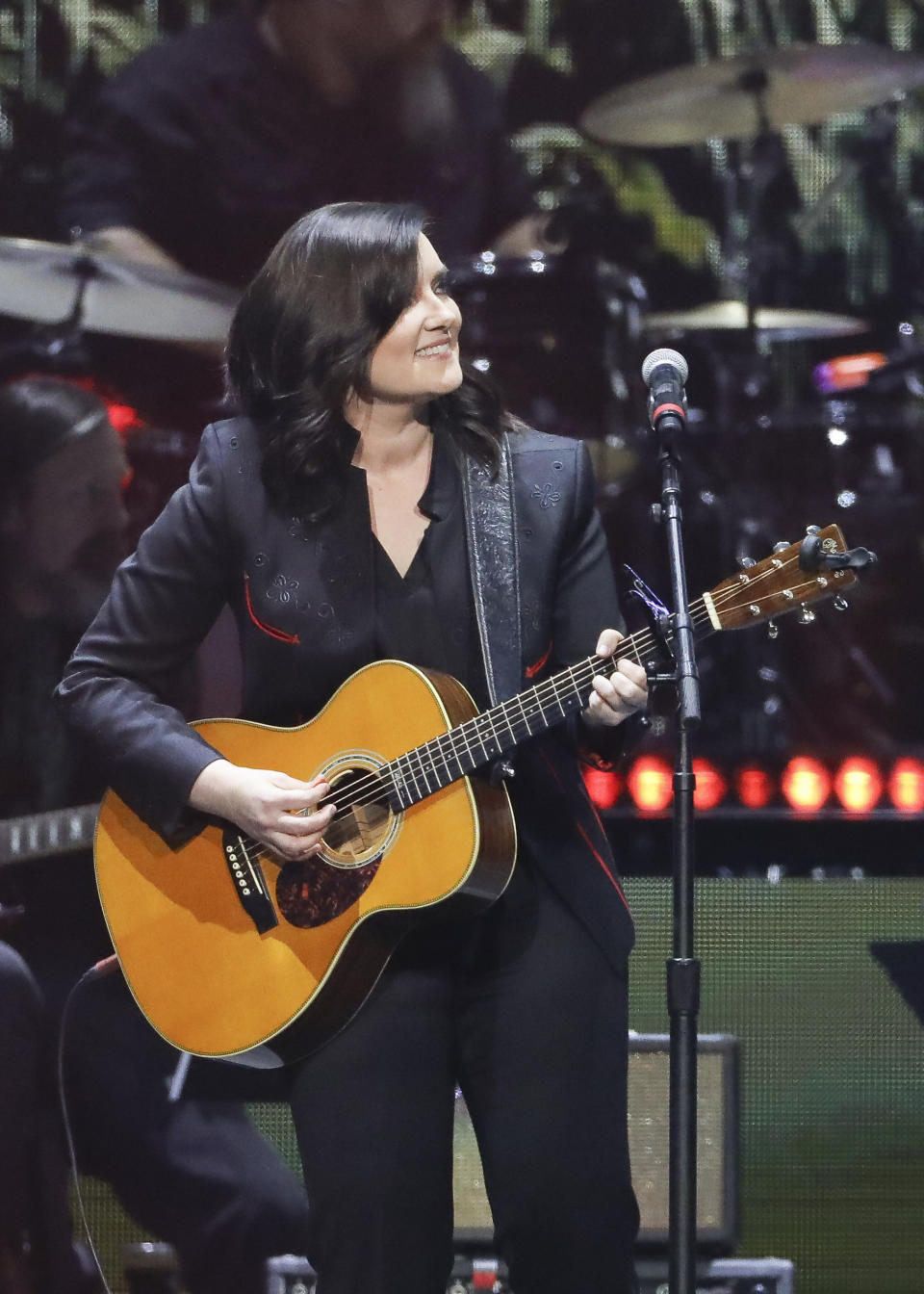 FILE - This April 1, 2019 file photo shows Brandy Clark performing at Loretta Lynn's 87th Birthday Tribute in Nashville, Tenn. What started as a joke on Twitter about an unwritten rule among country radio stations not to play two female artists in a row prompted outrage by country music stars, but also pledges to give women equal airtime. CMT announced on Tuesday, Jan. 21, 2020, that they would institute equal airplay for female artists across their two channels. And a country radio station in Ontario, Canada, started an equal play initiative for one week, pledging to split the airplay time 50-50 between men and female voices. (Photo by Al Wagner/Invision/AP, File)