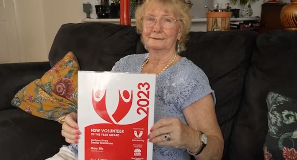 Mary Ellis pictured holding her nominee certificate for the NSW Volunteer of the Year.