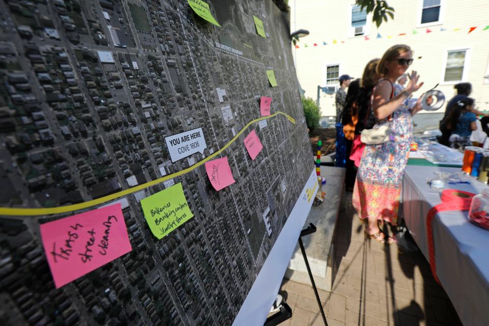 A map showing various projects by New Bedford Economic Development Council was seen at the "Love Locks" sculpture unveiling at the Nye Street Pocket Park at the intersection of Acushnet Avenue and Nye Street in New Bedford.