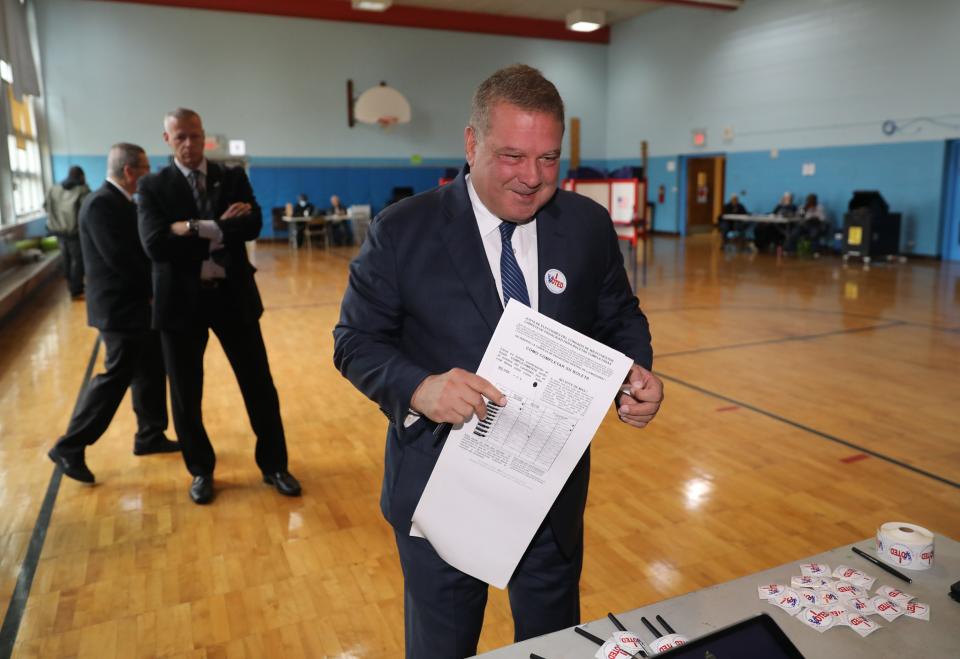 Yonkers Mayor Mike Spano greets election workers as he arrives to vote at the Khalil Gibran School in Yonkers on Election Day, Nov. 7, 2023.