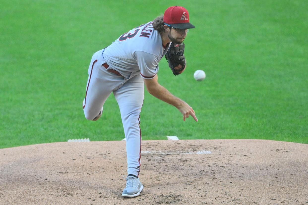 Aug 2, 2022; Cleveland, Ohio, USA; Arizona Diamondbacks starting pitcher Zac Gallen (23) delivers a pitch in the first inning against the Cleveland Guardians at Progressive Field.