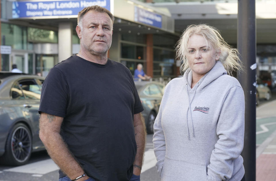 The parents of Archie Battersbee, Paul Battersbee and Hollie Dance, speak to the media outside the Royal London hospital in Whitechapel, east London, Tuesday Aug. 2, 2022. Archie Battersbee, 12, was found unconscious at home with a ligature over his head on April 7, and been in coma since then. His family, at the center of a life-support battle, says it has appealed to the European Court of Human Rights in a last-ditch bid to stop a hospital ending his treatment. (Jonathan Brady/PA via AP)