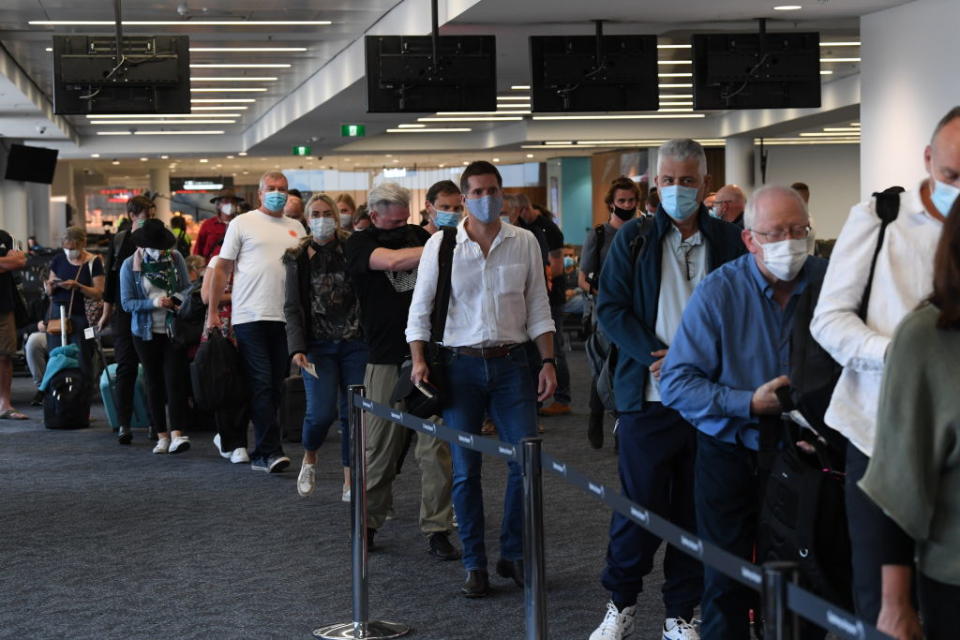 Passengers boarding QF1, a Qantas Boeing 787 Dreamliner aircraft at Sydney Airport en route to London via Darwin in Sydney, Australia. 