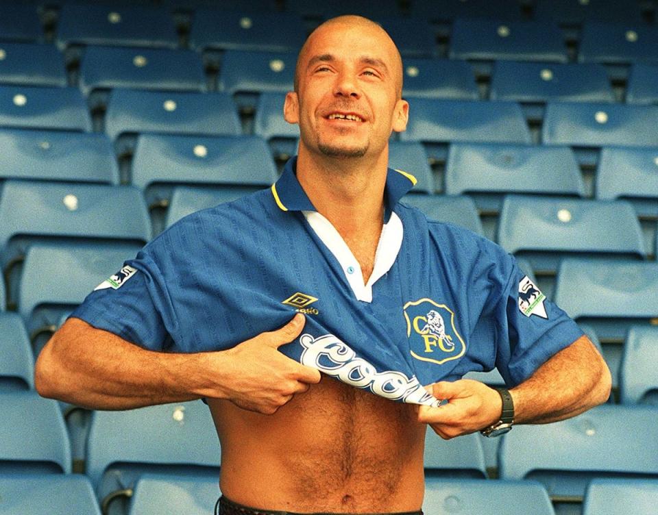 17th June 1996: New Chelsea signing Gianlucia Vialli tries on his new shirt on the terraces at Stamford Bridg (PA)