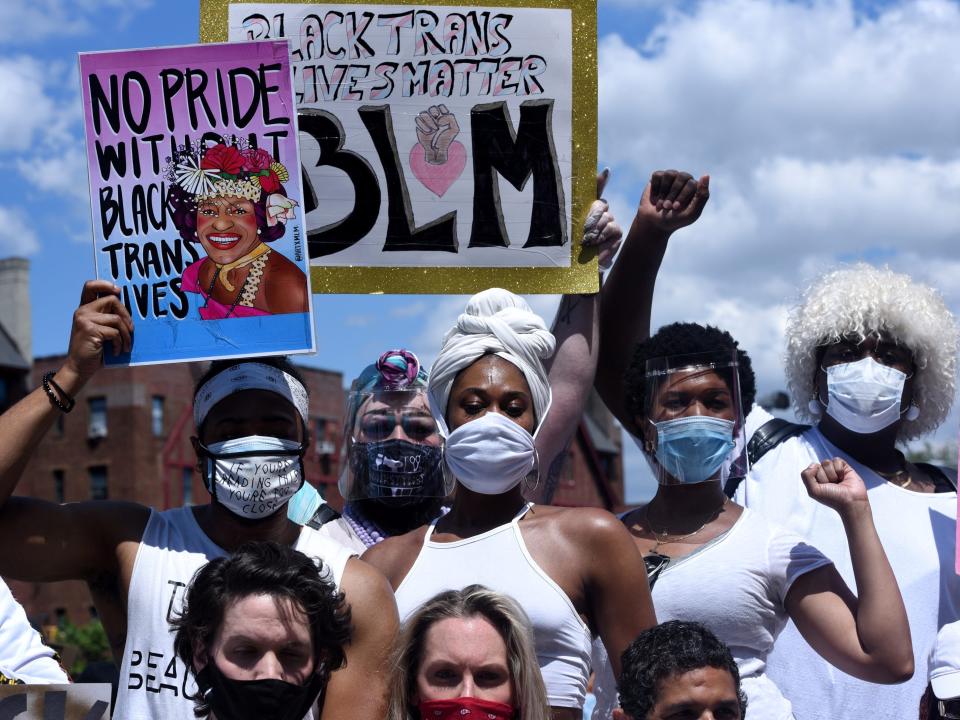 FILE PHOTO: People participate in a Black Trans Lives Matter rally in the Brooklyn borough in New York City, U.S., June 14, 2020. REUTERS/Stephanie Keith     