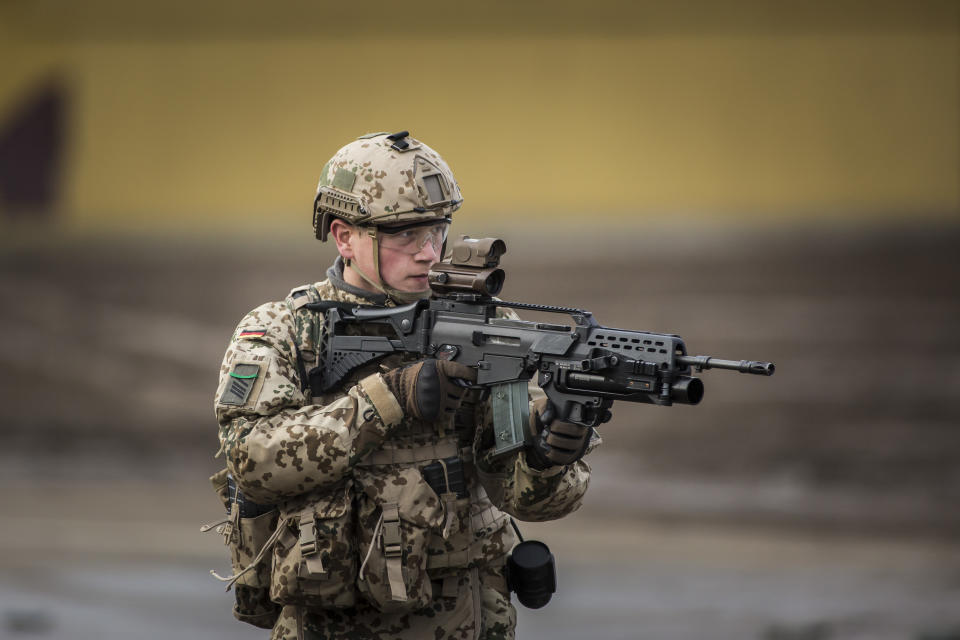 MUNSTER, GERMANY - OCTOBER 13: Soldier with equipment 'Infantryman of the Future - Extended System (IdZ-ES) and ready to fire gun. Shot during an exercise of the land forces on October 13, 2017 in Munster, Germany. (Photo by Florian Gaertner/Photothek via Getty Images)