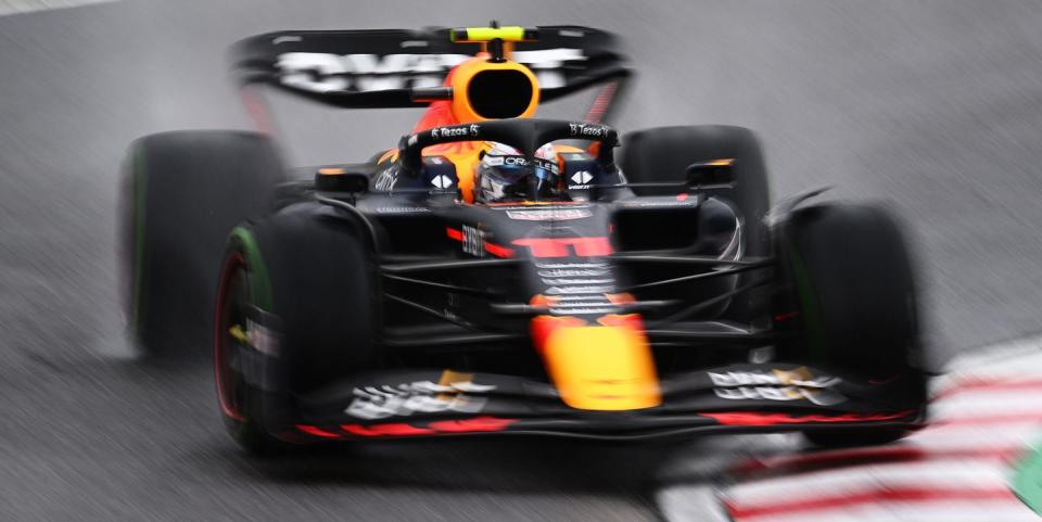 suzuka, japan   october 09 sergio perez of mexico driving the 11 oracle red bull racing rb18 on his way to the grid prior to the f1 grand prix of japan at suzuka international racing course on october 09, 2022 in suzuka, japan photo by clive masongetty images