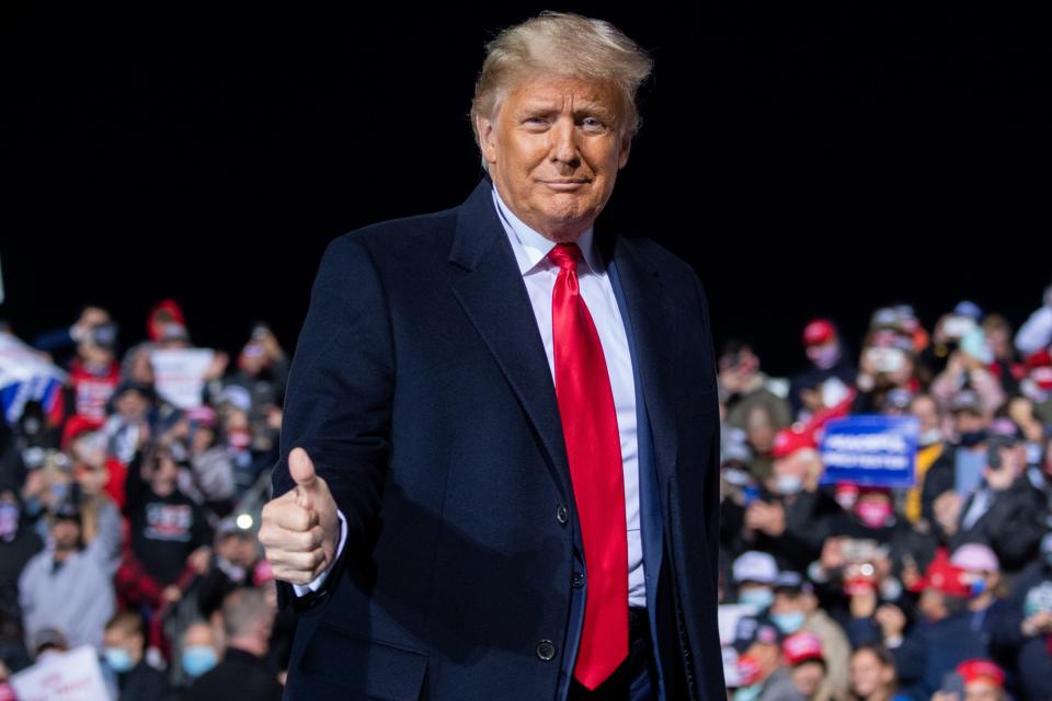 US President Donald Trump gives a thumbs up as he arrives to hold a Make America Great Again rally as he campaigns at John Murtha Johnstown-Cambria County Airport in Johnstown, Pennsylvania, October 13, 2020. (Photo by SAUL LOEB / AFP) (Photo by SAUL LOEB/AFP via Getty Images)