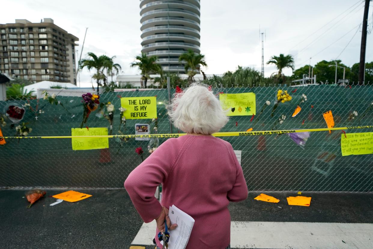 A shrine is set up outside St. Joseph Catholic Church in Surfside, Fla. on Monday, June 28, 2021, near the collapsed building for people still missing or dead.