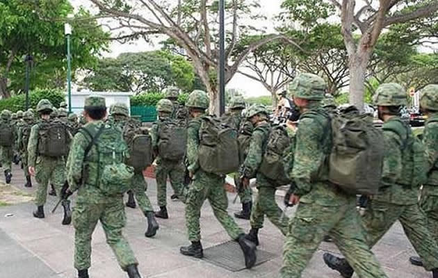 The Ministry of Defence (MINDEF) is reportedly considering structured fitness training for National Service pre-enlistees who fail to achieve a silver standard for their National Physical Fitness Award (NAPFA) a year before enlistment. (Yahoo photo)