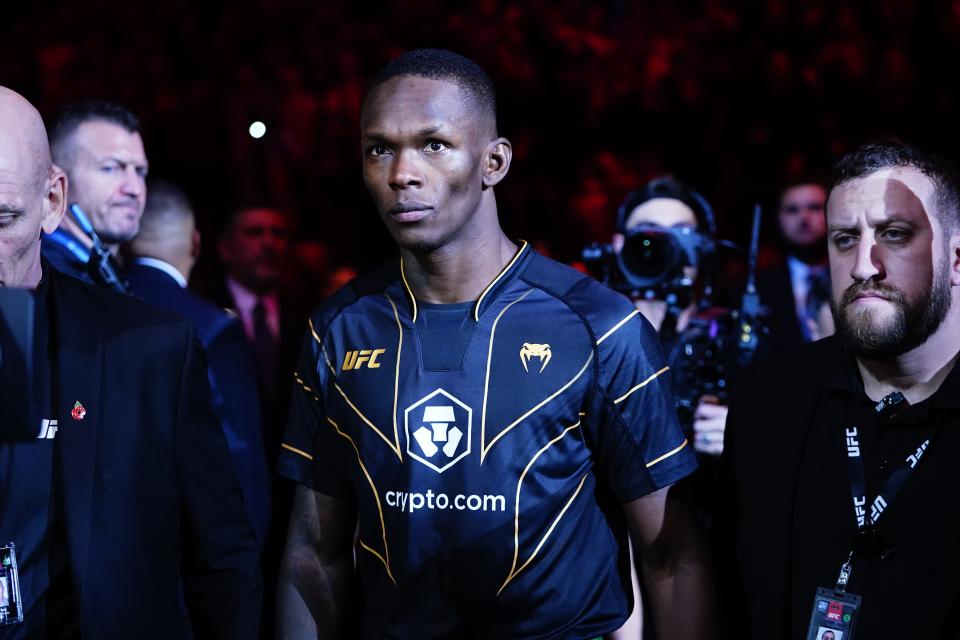 FILE - Nigeria's Israel Adesanya arrives for his middleweight bout title bout against Brazil's Alex Pereira in the UFC 281 mixed martial arts event, Sunday, Nov. 13, 2022, in New York. No. 1 title contender Israel Adesanya faces champion Alex Pereira for the middleweight belt on Saturday, April 8, 2023, in Miami in UFC 287. Pereira knocked out Adesanya in the fifth round in November.(AP Photo/Frank Franklin II)