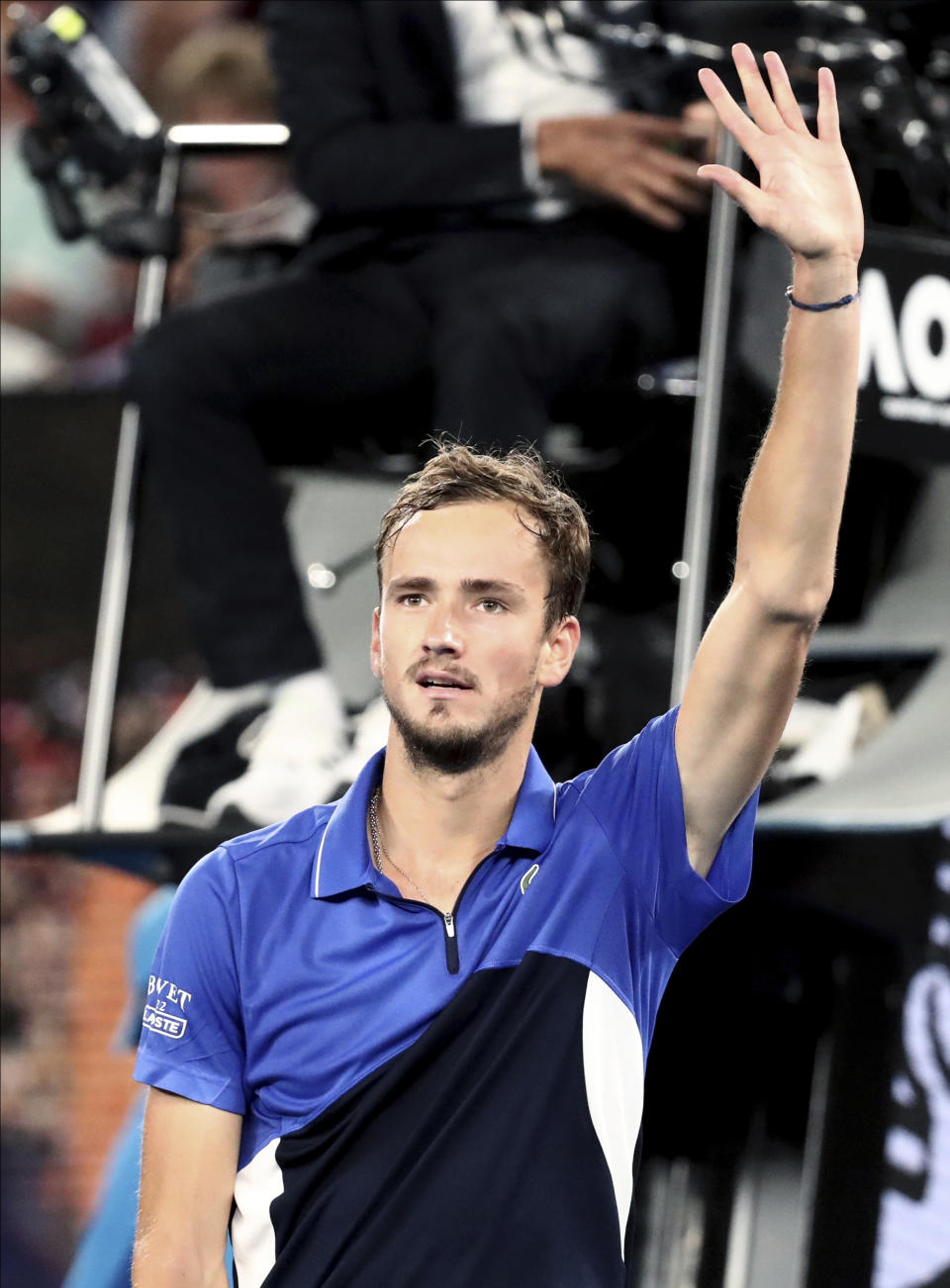 Russia's Daniil Medvedev waves after defeating Australia's Alexei Popyrin in their third round singles match at the Australian Open tennis championship in Melbourne, Australia, Saturday, Jan. 25, 2020. (AP Photo/Dita Alangkara)