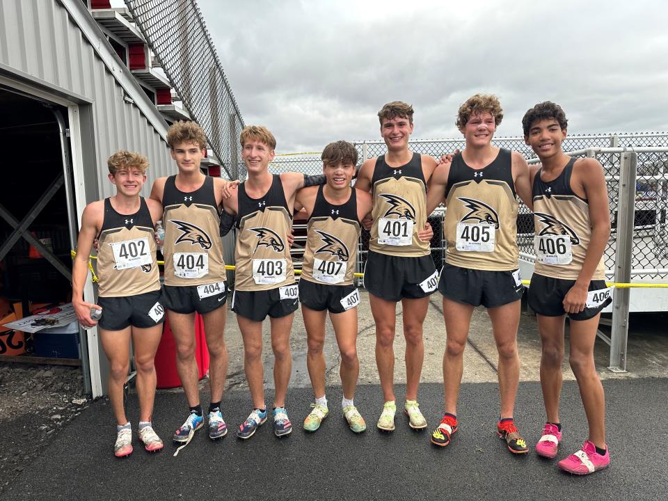 From left, members of Corning's Class A state champion boys cross country team Nov. 12, 2022: Joshua Beres, Gabe Cornfield, DJ Cornfield, Tevin McLaren, Ashton Bange, Marcus Homa and Jaxyn Mahoney.