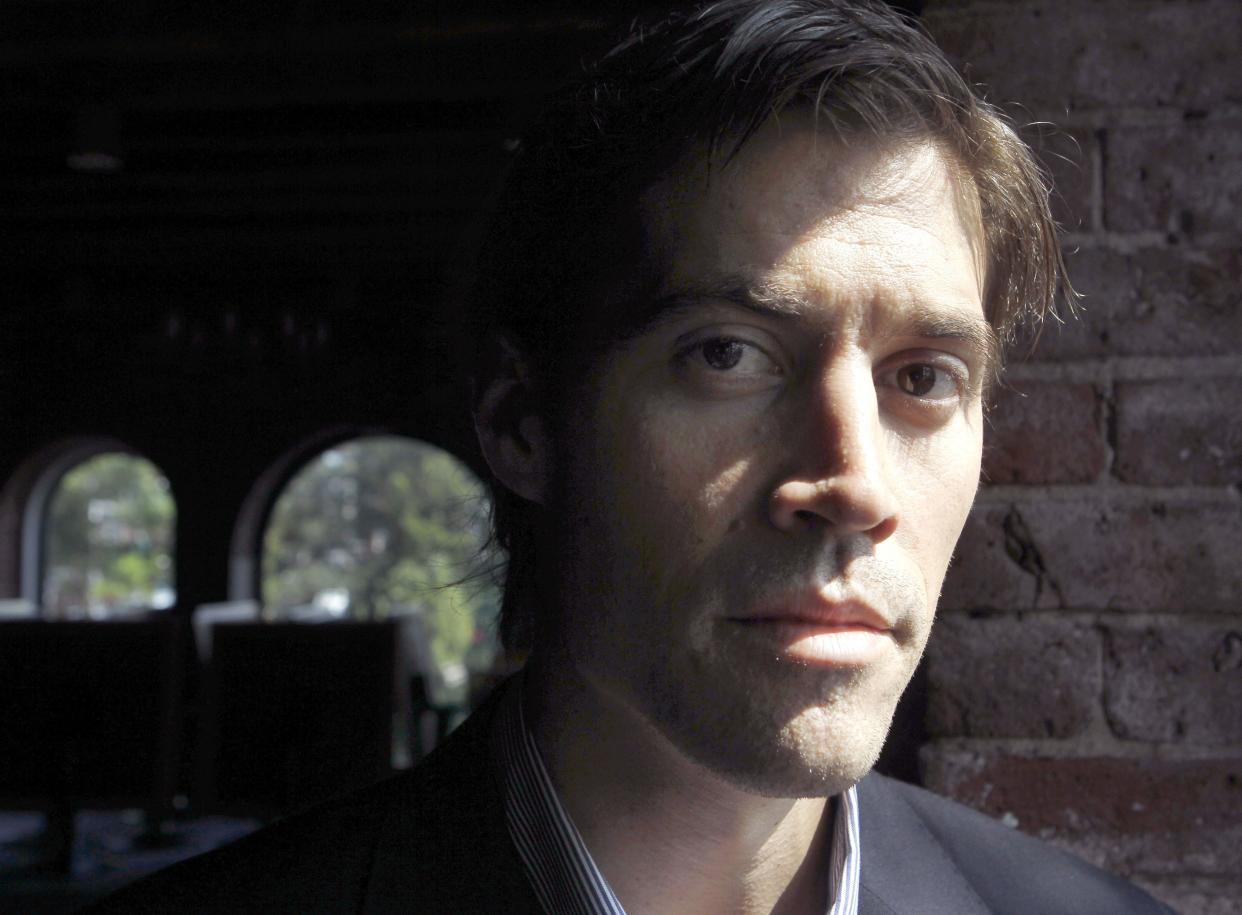 In this May 27, 2011 photo, American journalist James Foley poses for a photo in Boston. 