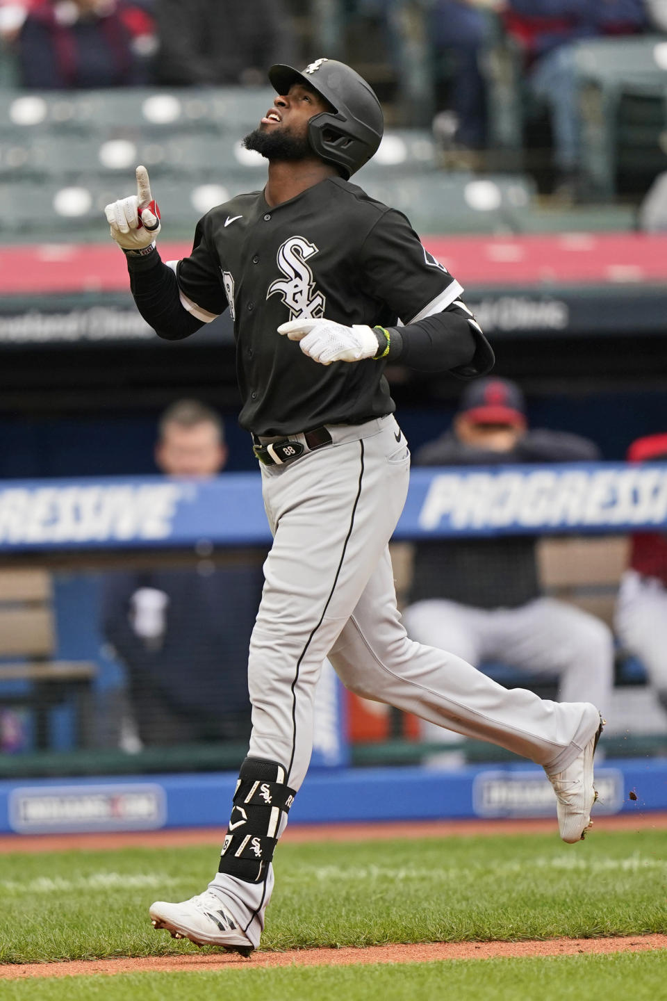 Chicago White Sox's Luis Robert runs the bases after hitting a solo home run in the second inning in the first baseball game of a doubleheader against the Cleveland Indians, Thursday, Sept. 23, 2021, in Cleveland. (AP Photo/Tony Dejak)