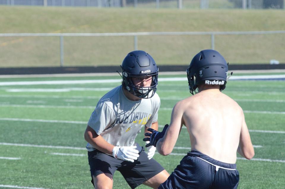 Gaylord's Gus James and Louden Stradling take reps against each other during a practice on Tuesday, August 8.