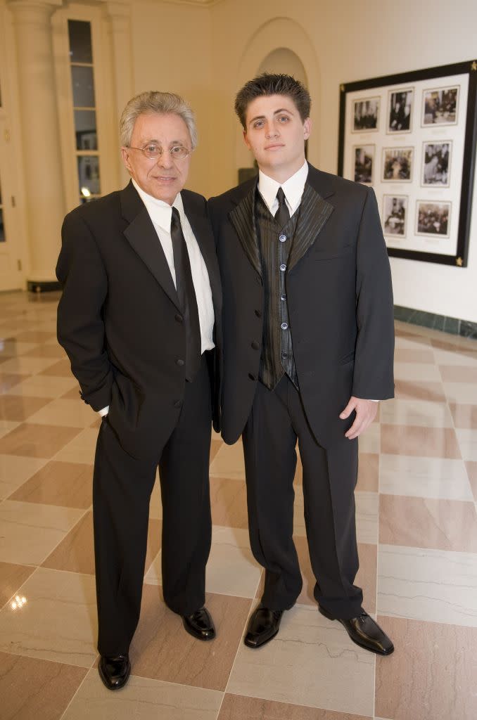 Valli (left) with his son Francesco at the White House in October 2008. Greg Mathieson/Shutterstock