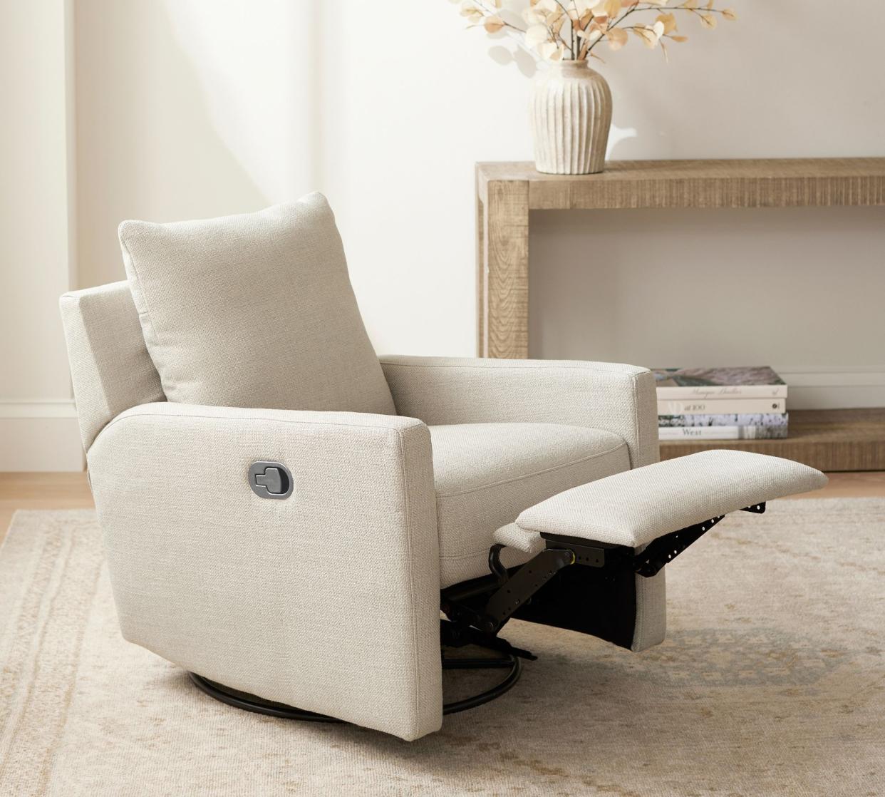<p><a href="https://go.redirectingat.com?id=74968X1596630&url=https%3A%2F%2Fwww.potterybarn.com%2Fproducts%2Fayden-square-arm-upholstered-swivel-recliner%2F&sref=https%3A%2F%2Fwww.cosmopolitan.com%2Flifestyle%2Fg44788291%2Frecliners-for-small-spaces%2F" rel="nofollow noopener" target="_blank" data-ylk="slk:Shop Now;elm:context_link;itc:0;sec:content-canvas" class="link rapid-noclick-resp">Shop Now</a></p><p>Ayden Square Arm Upholstered Swivel Recliner</p><p>potterybarn.com</p><p>$1149.00</p><span class="copyright">Pottery Barn</span>