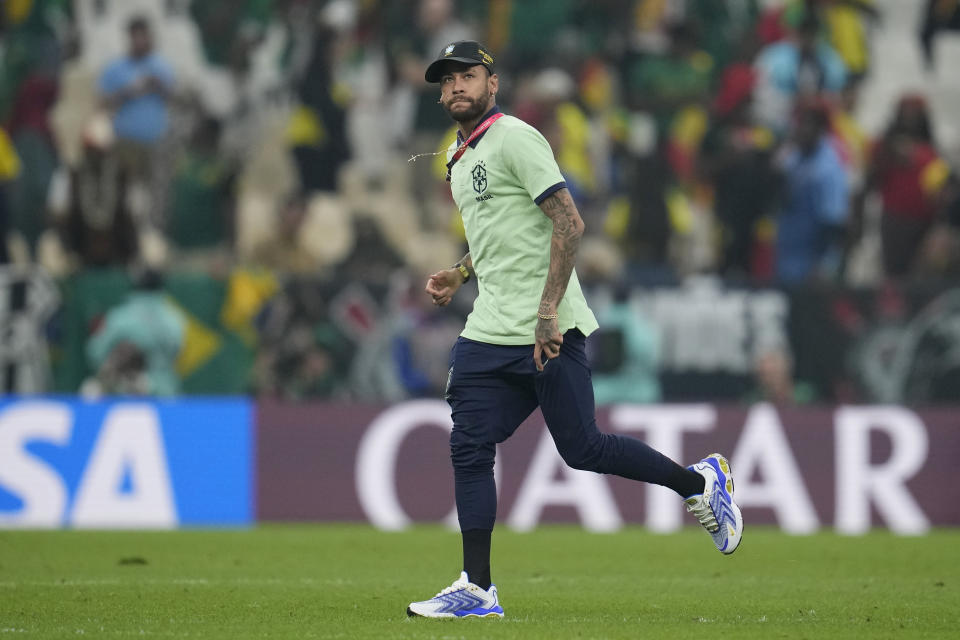 Brazil's Neymar applauds fans at the end of the World Cup group G soccer match between Cameroon and Brazil, at the Lusail Stadium in Lusail, Qatar, Friday, Dec. 2, 2022. (AP Photo/Natacha Pisarenko)