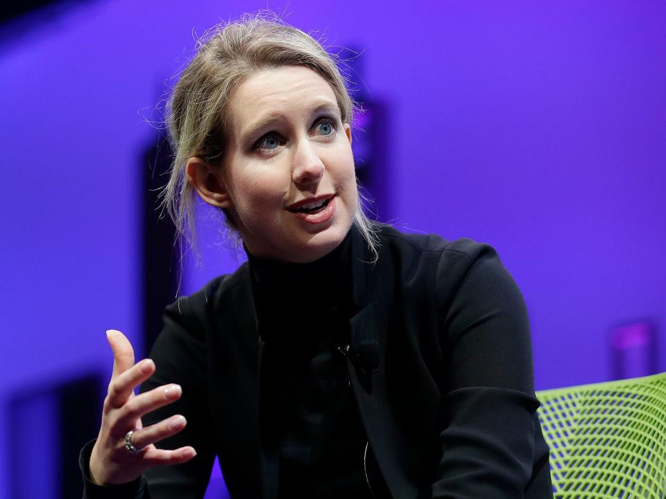 Elizabeth Holmes is accused of fraud on a massive scale. So why is everyone obsessed with her voice?