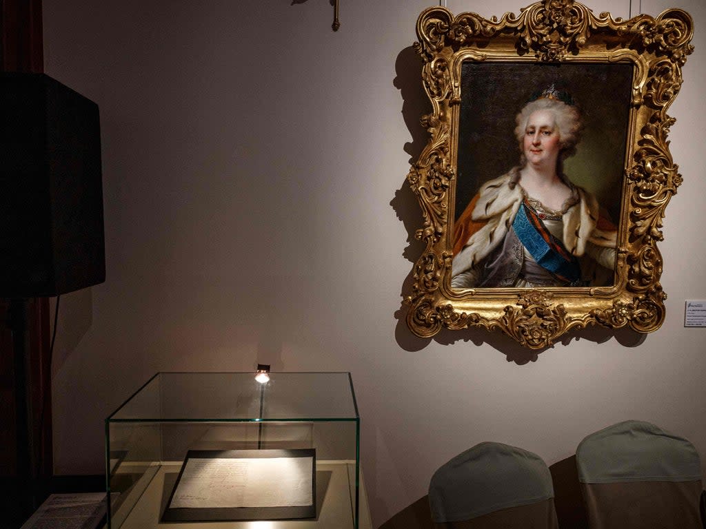 Catherine the Great’s letter supporting vaccinations is displayed in Moscow on 18 November  (AFP via Getty Images)