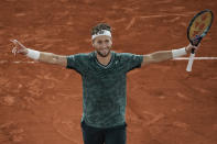 Norway's Casper Ruud celebrates winning the semifinal match against Croatia's Marin Cilic in four sets, 3-6, 6-4, 6-2, 6-2, at the French Open tennis tournament in Roland Garros stadium in Paris, France, Friday, June 3, 2022. (AP Photo/Christophe Ena)