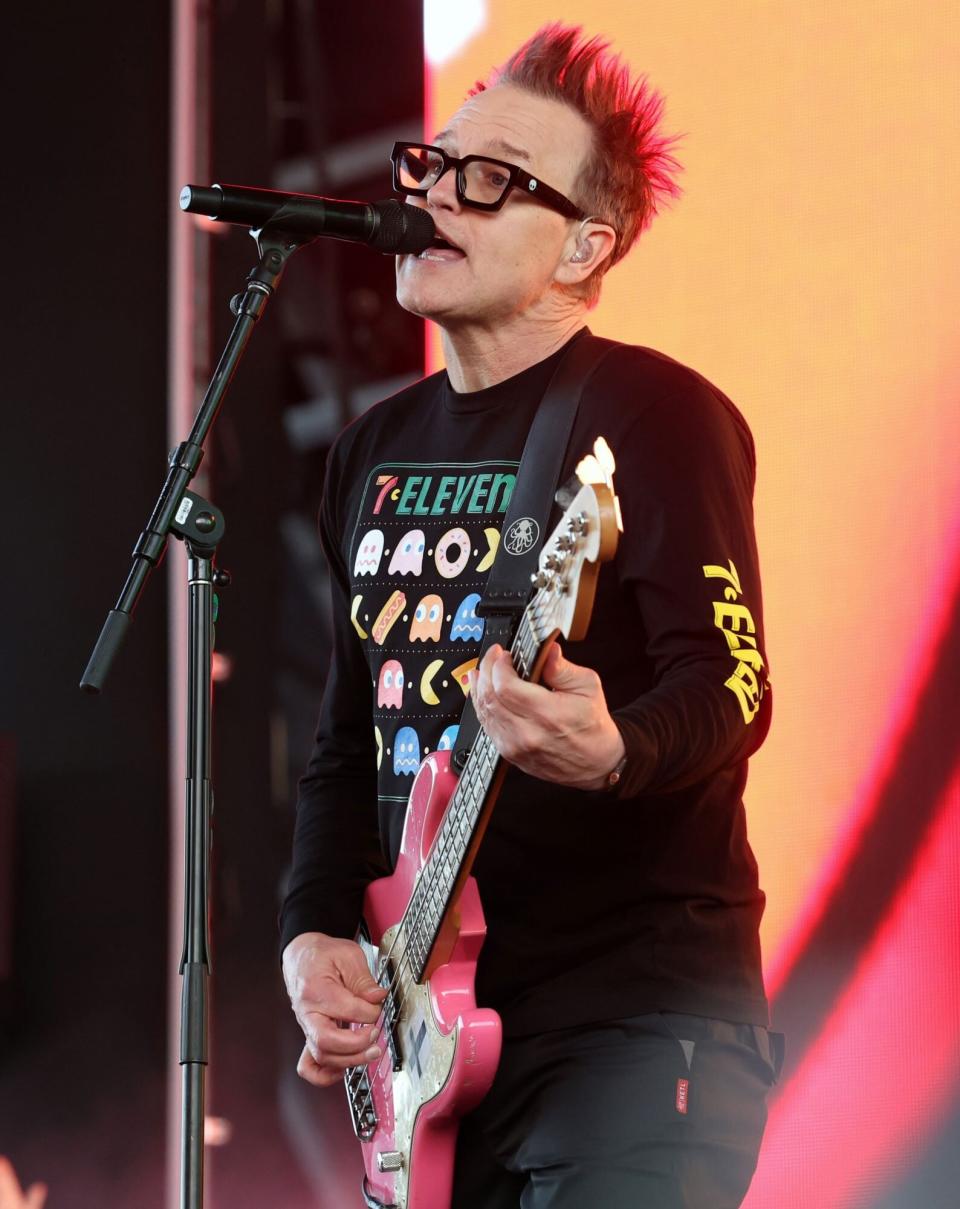 INDIO, CALIFORNIA - APRIL 14: Mark Hoppus of Blink-182 performs at the Sahara Tent during the 2023 Coachella Valley Music and Arts Festival on April 14, 2023 in Indio, California. (Photo by Monica Schipper/Getty Images for Coachella)