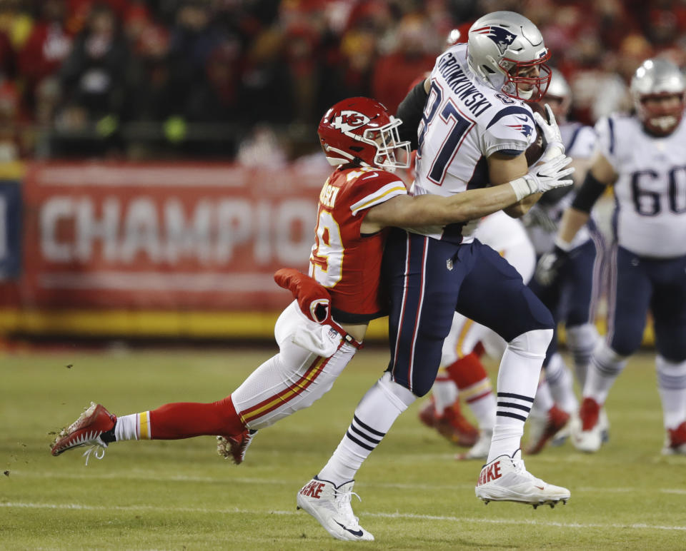 Patriots tight end Rob Gronkowski (87) makes a catch against Chiefs defensive back Daniel Sorensen during the AFC championship game on Jan. 20 in Kansas City, Mo. (AP Photo/Charlie Neibergall)