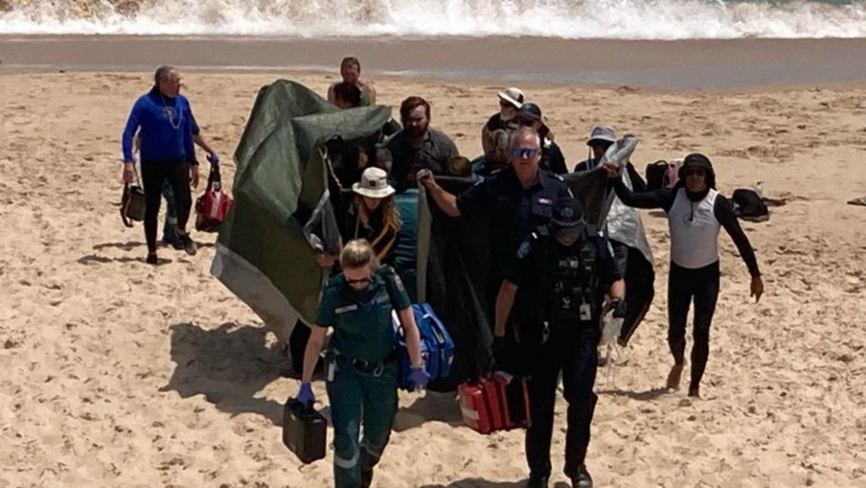 Assignment Freelance Picture A woman has been taken to hospital after she was attacked by a shark
 at Port Noarlunga in South Australia on Friday. Picture: 7News