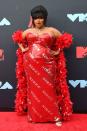 <p>As the breakout star of the year, Lizzo’s “Siren” dress by Moschino was red-hot and entirely appropriate. The hair full of secrets and fabulous boa? The icing on the cake.</p>