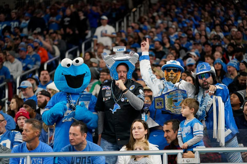 Detroit Lions fans cheer during the second half of an NFL football game against the Jacksonville Jaguars, Sunday, Dec. 4, 2022, in Detroit.