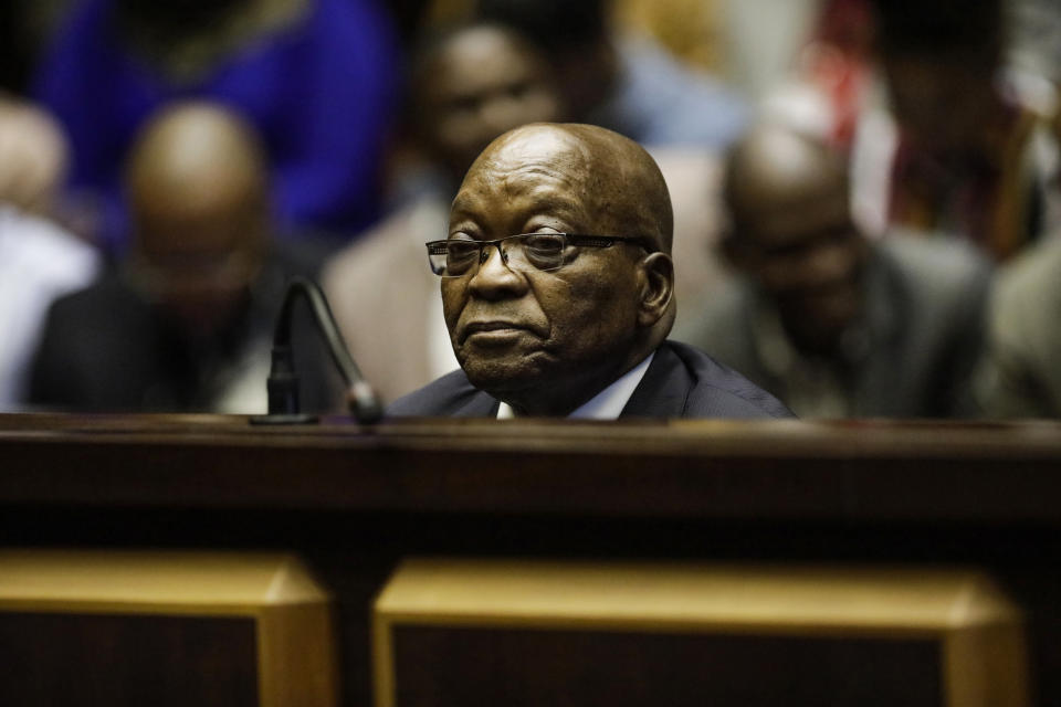 FILE - In this Oct. 15, 2019 file photo, former South African President Jacob Zuma appears in the High Court in Pietermaritzburg, South Africa. The South African Broadcasting Corporation reports that an arrest warrant was issued for former president Jacob Zuma by a judge in South Africa Tuesday Feb. 4, 2020, for failing to appear at court in a corruption case. (Michele Spatari/Pool via AP, File)