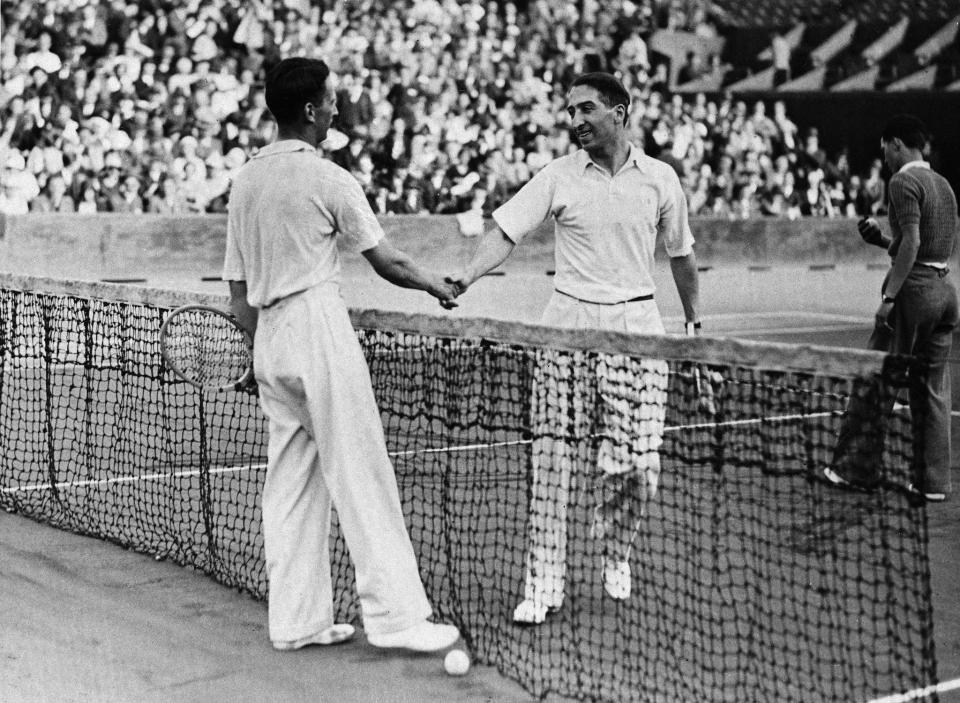 Rene Lacoste (right) and H.G.N. Lee (left) at the Roland Garros Stadium in Paris, France, June 13, 1932. - Credit: AP