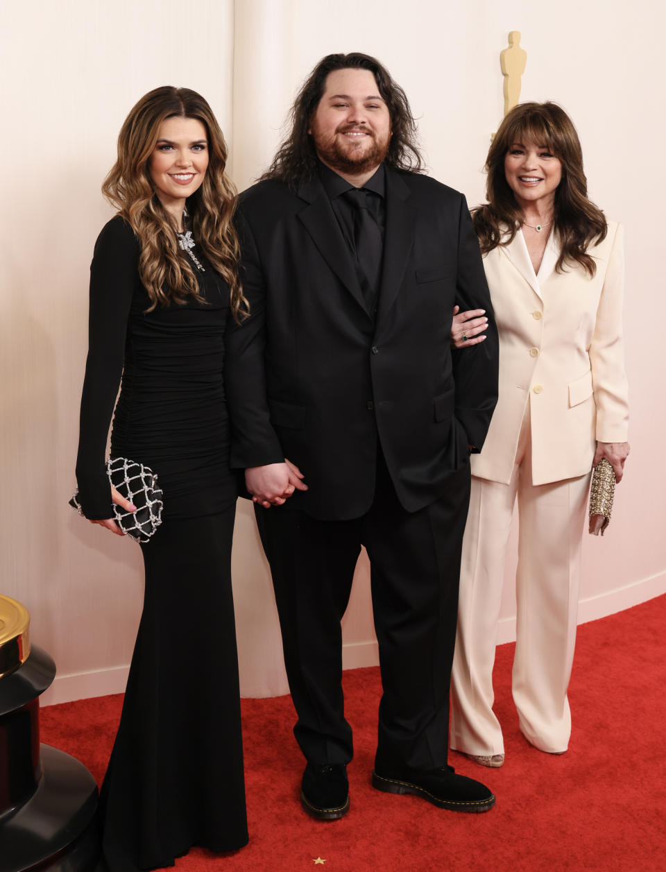 From left, Andraia Allsop, Wolfgang Van Halen and Valerie Bertinelli at the Academy Awards on March 10.