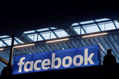 Facebook logo is seen at a start-up companies gathering at Paris' Station F in Paris, France, January 17, 2017. REUTERS/Philippe Wojazer/File Photo