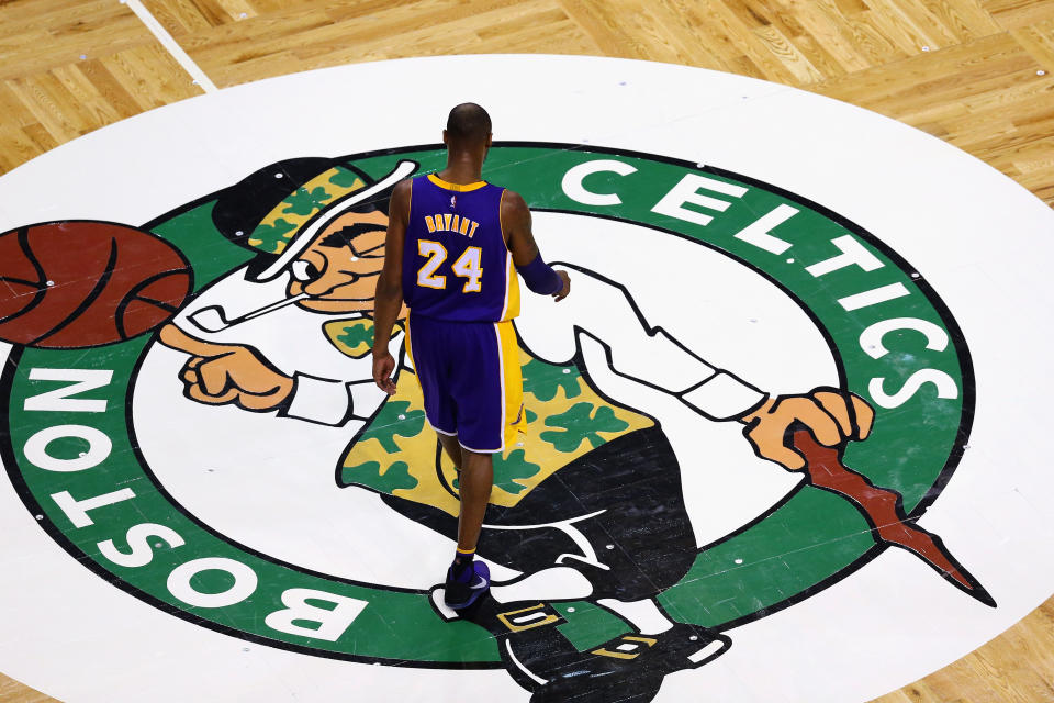 BOSTON, MA - DECEMBER 30:  Kobe Bryant #24 of the Los Angeles Lakers walks towards the bench during a time out against the Boston Celtics  during the fourth quarter at TD Garden on December 30, 2015 in Boston, Massachusetts. The Lakers defeat the Celtics 112-104. NOTE TO USER: User expressly acknowledges and agrees that, by downloading and/or using this photograph, user is consenting to the terms and conditions of the Getty Images License Agreement.  (Photo by Maddie Meyer/Getty Images)