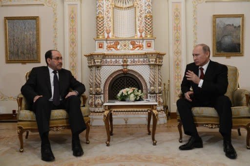 Iraqi Prime Minister Nuri al-Maliki (left) meets Russia's President Vladimir Putin at the Novo-Ogaryovo residence outside Moscow earlier this month. "When Maliki returned from his trip to Russia, he had some suspicions of corruption, so he decided to review the whole deal... There is an investigation going on, on this," says Maliki's spokesman Ali Mussawi