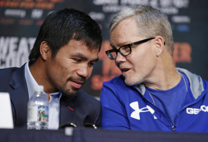 Trainer Freddie Roach, right, says Manny Pacquiao has been outstanding in camp. (AP)