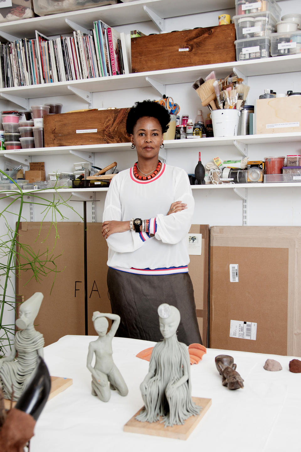 Artist Wangechi Mutu in her Brooklyn studio with models for her sculptures that were installed outside the Metropolitan Museum of Art in New York, Sept. 26, 2019. | Sunny Shokrae—The New York Times/Redux