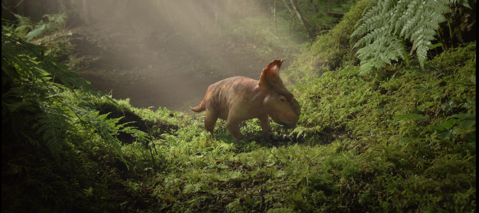 In this image released by 20th Century Fox, a young Pachyrhinosaurus named Patchi is shown in a scene from the film, "Walking With Dinosaurs." (AP Photo/20th Century Fox)