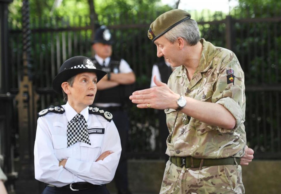 Head of the Met Police Cressida Dick speaking with a soldier. (PA)