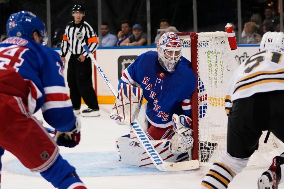 New York Rangers goaltender Igor Shesterkin (31) protects his net during the first period of an NHL preseason hockey game against the Boston Bruins Thursday, Oct. 5, 2023, in New York.