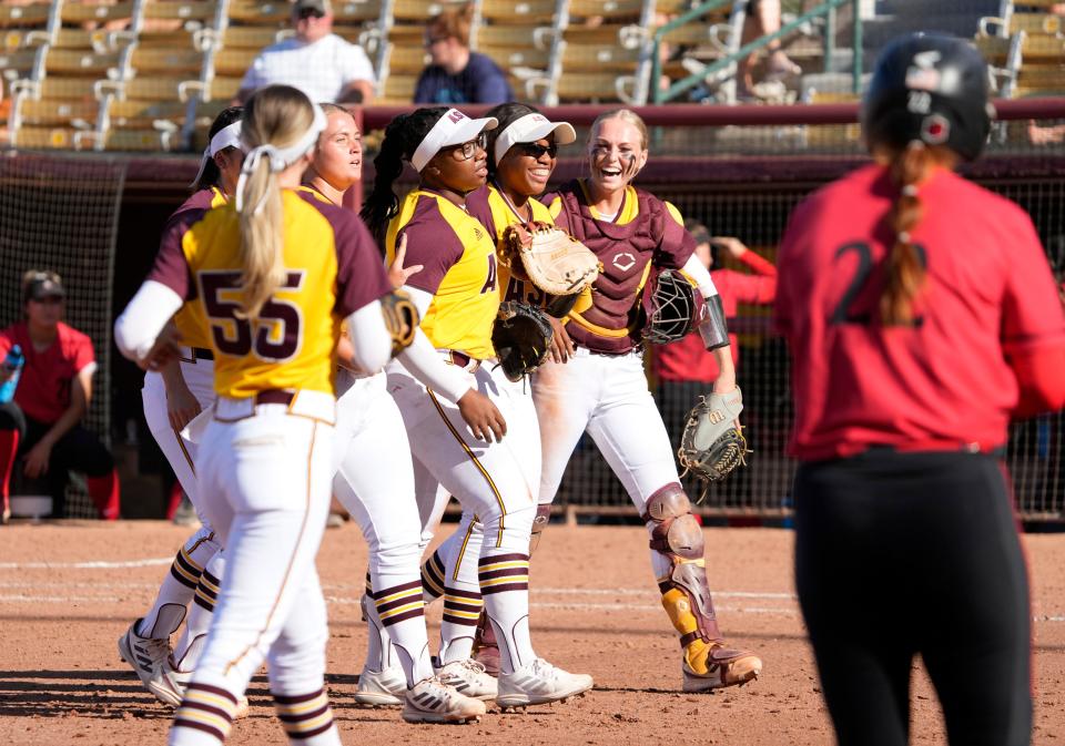 May 22, 2022; Tempe, Ariz., U.S; Arizona State players celebrate a defensive play against San Diego State during the NCAA softball Tempe regional final at Farrington Stadium. Mandatory Credit: Michael Chow-Arizona Republic