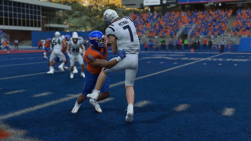 Utah State quarterback Spencer Petras is sacked during a simulated game between Utah State and Boise State in the EA Sports College Football 25 video game. | EA Sports College Football 25