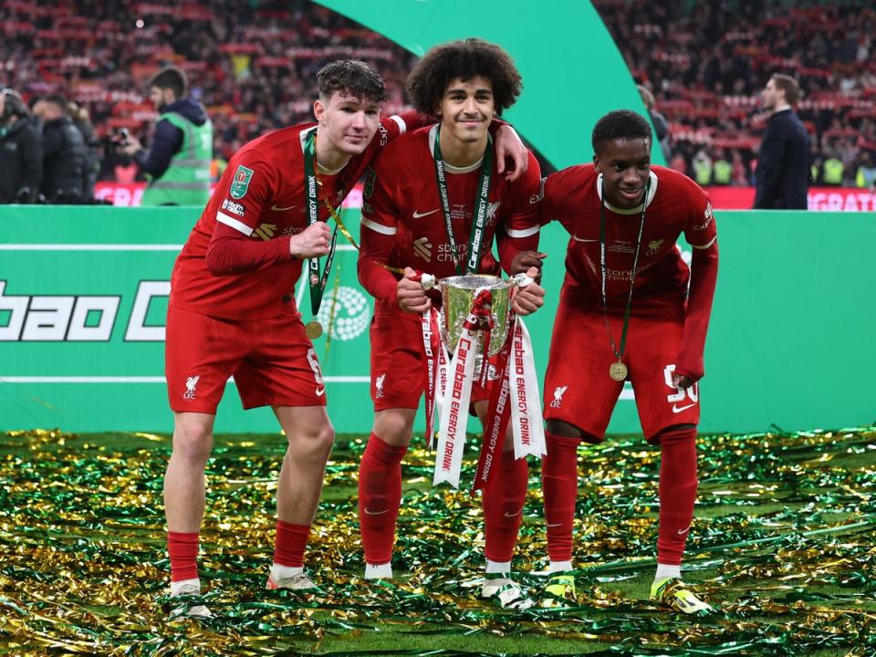 Liverpool's Lewis Koumas, Jayden Danns and Trey Nyoni celebrate winning the Carabao Cup (REUTERS)